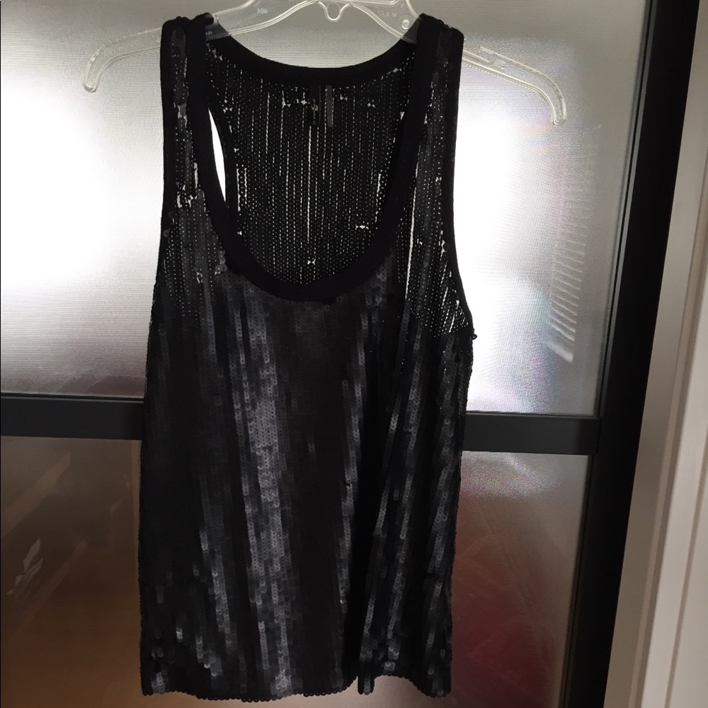 Sequined tank top.  Versatile dressed up or down